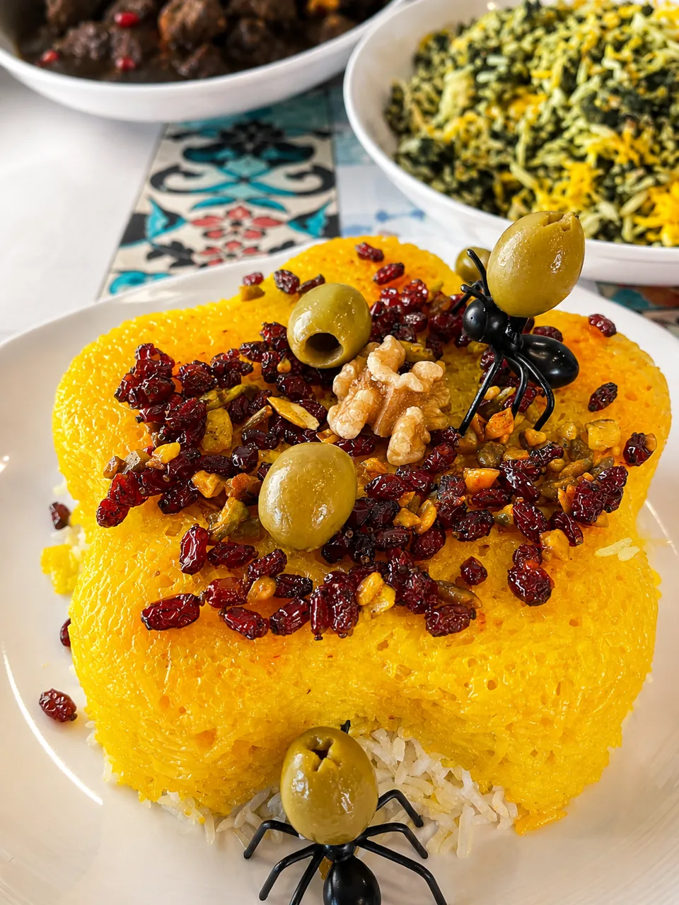 Golden saffron rice with barberries, walnuts and olives
